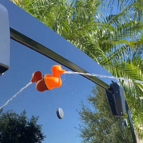 🚗💦 Meet the Ultimate Jeep Accessory: The Fun Middle Finger Spraying Duck! 🦆💥